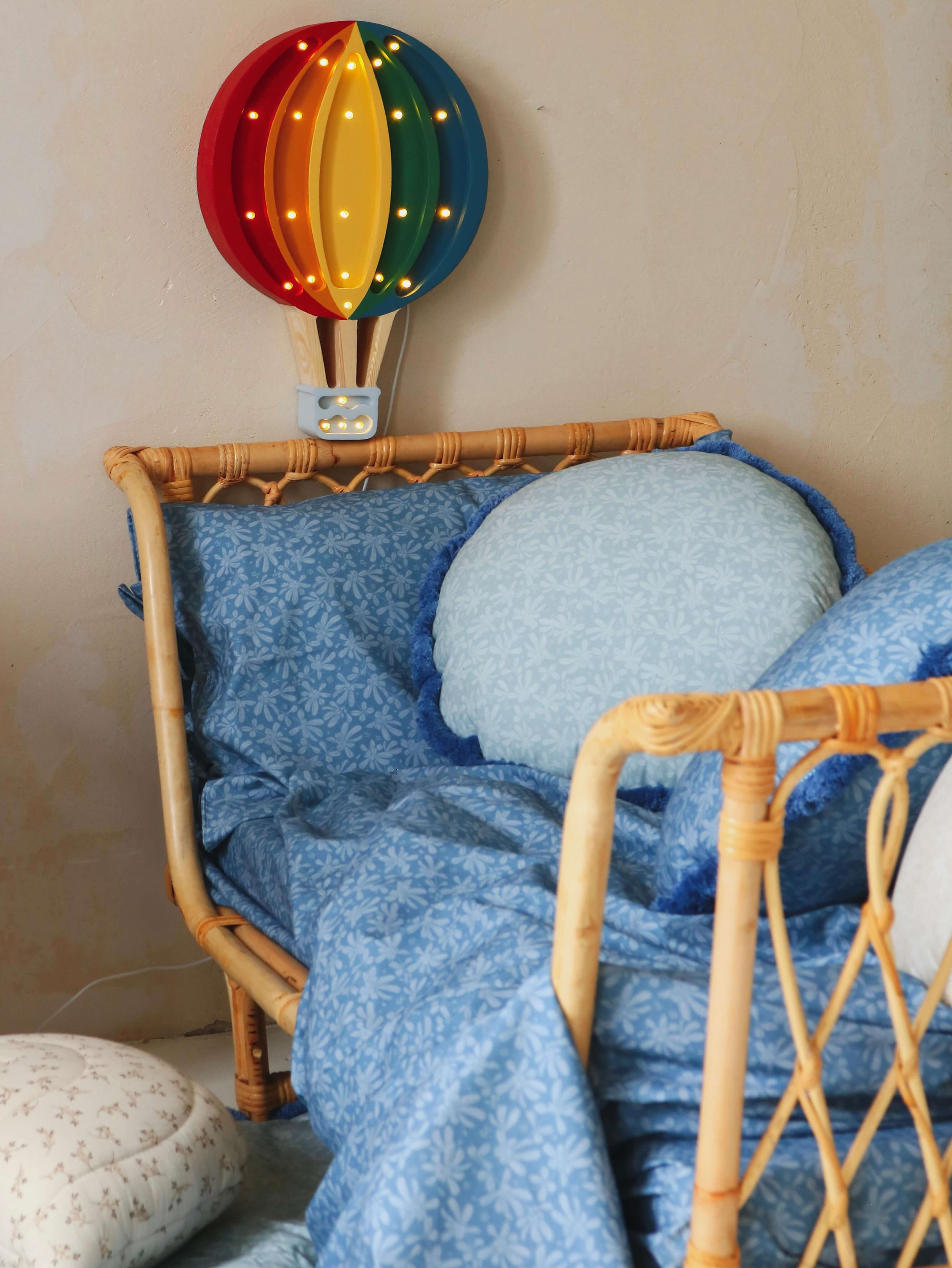 Tied-Closure Floral Bedding Set with Rattan Bed and Balloon Light